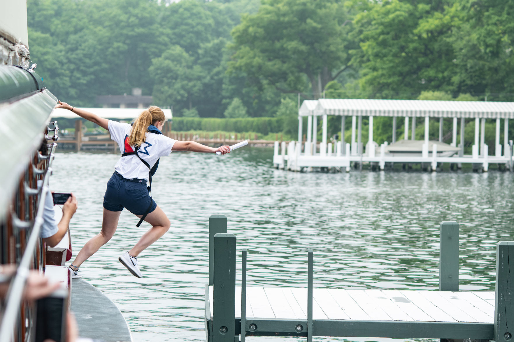 Lauren Kirkwood Jumper attempting to reach pier